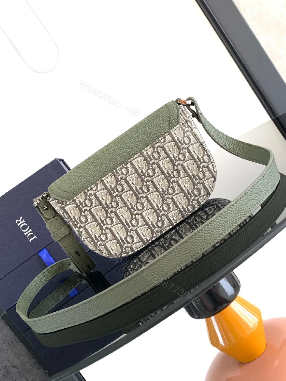 View 7 of Olive Pebbled Leather Crossbody with Monogram Accent
