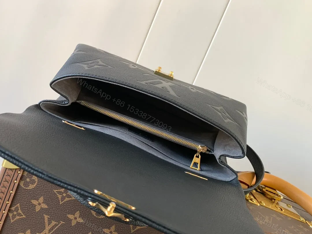 View 6 of LV MADELEINE 30 IN BLACK MIX WHITE MONOGRAM CALFSKIN EMBOSSED LOGO