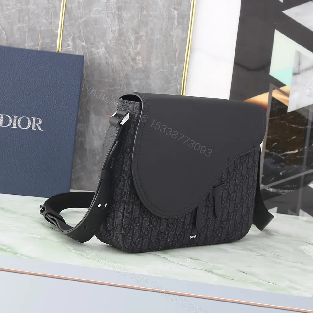 View 10 of Chic Black Monogram Crossbody with Textured Leather Flap