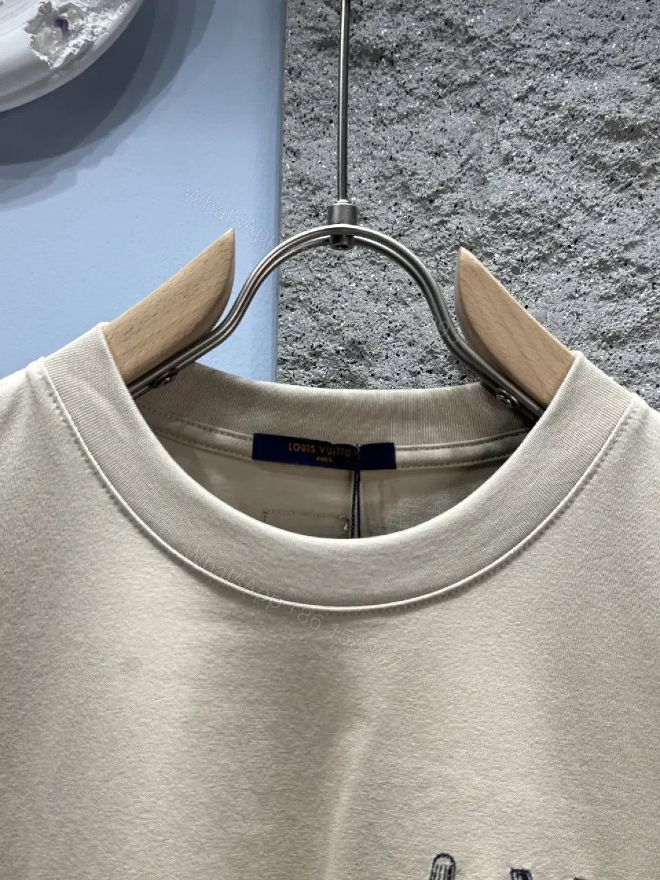 View 9 of Neutral Beige Luxe Tee: Soft Knit, Subtle LVM Monogram, Modern Fit