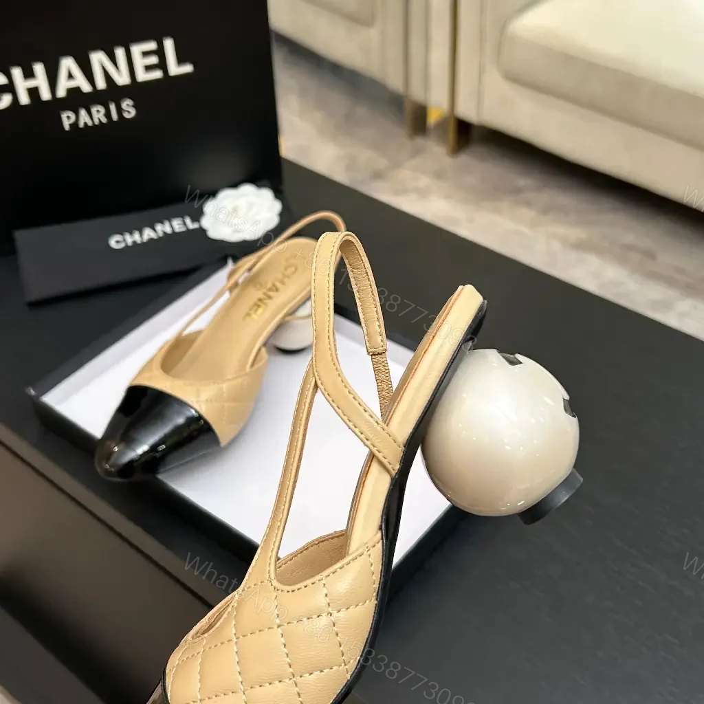 View 8 of Quilted Nude Slingback Pumps with Black Cap Toe and Spherical Heel
