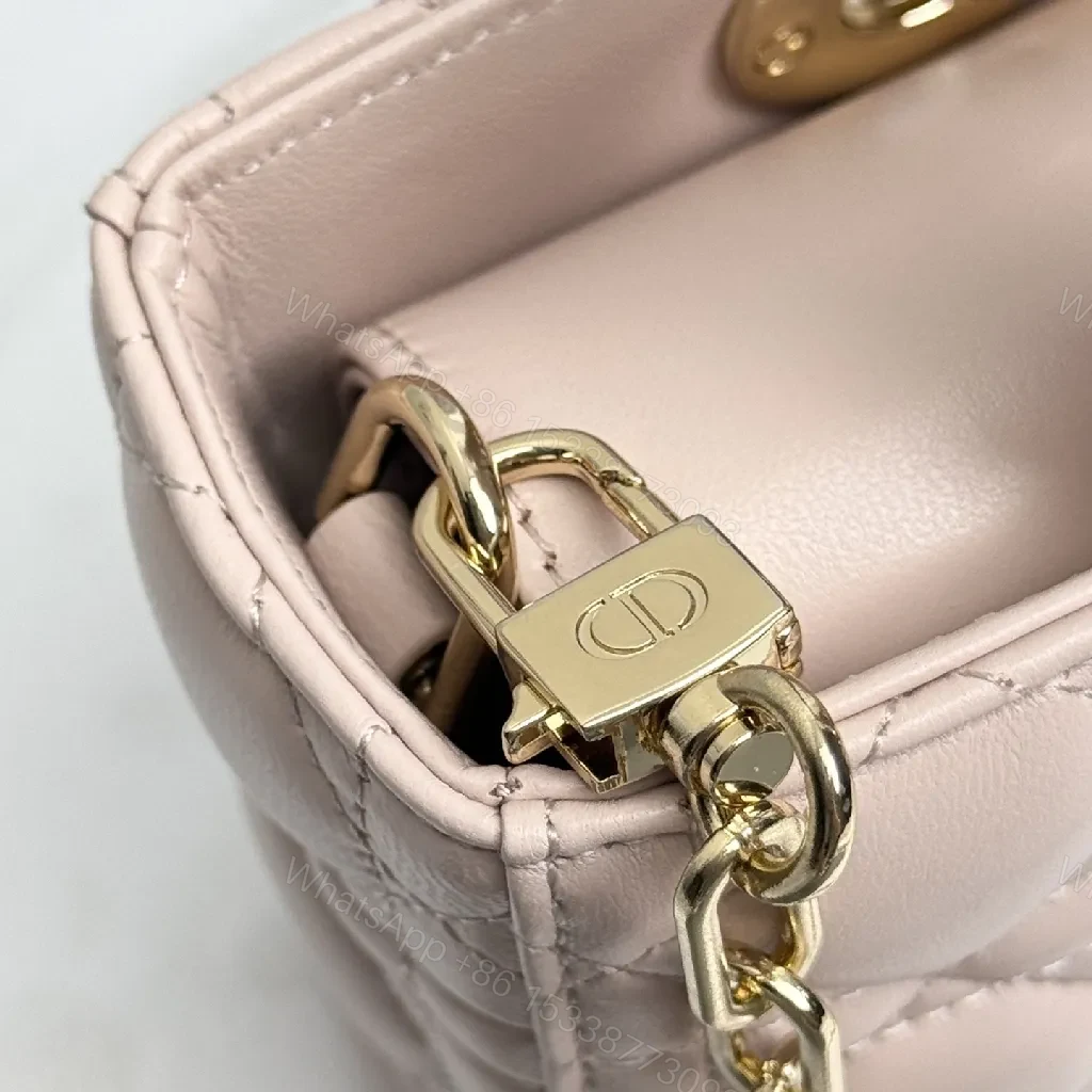 View 8 of Soft Pink Quilted Dome Bag: Mini Luxury Crossbody