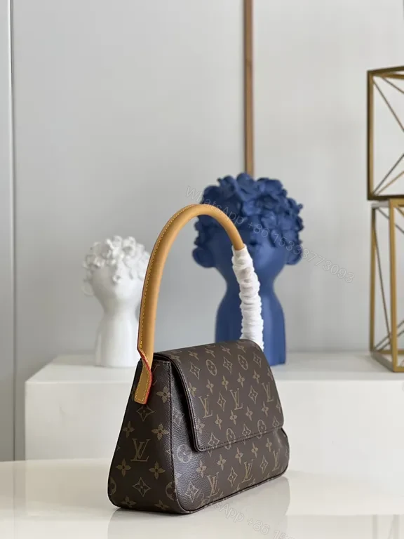 View 5 of Louis Vuitton Monogram Top-Handle Bag: Compact Luxury for Day to Night