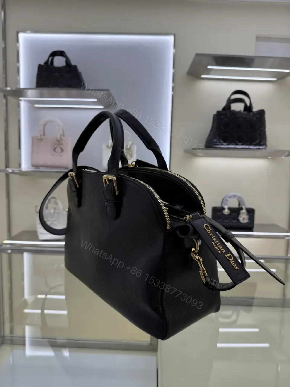 View 2 of Compact Luxury Satchel: Black Leather, Gold Hardware, Structured Style