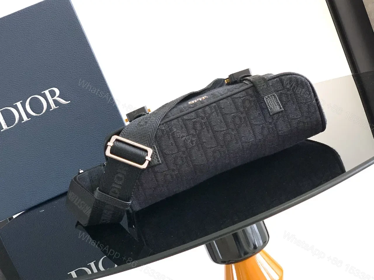 View 3 of Dark Monochrome Compact Messenger with Signature Detailing