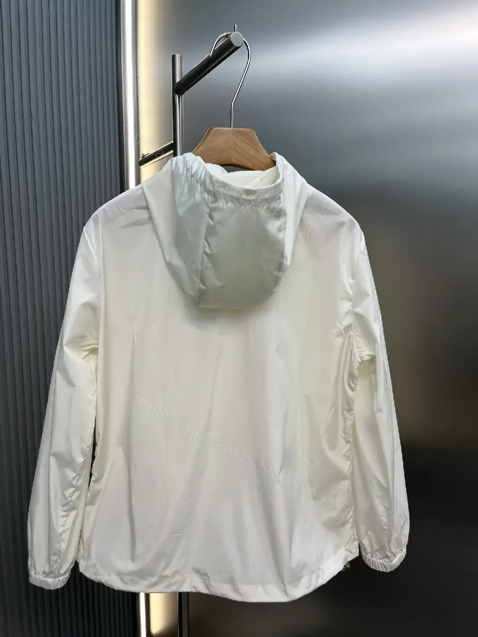 View 3 of Off-White Cream Lightweight Hooded Windbreaker with Zipper Front