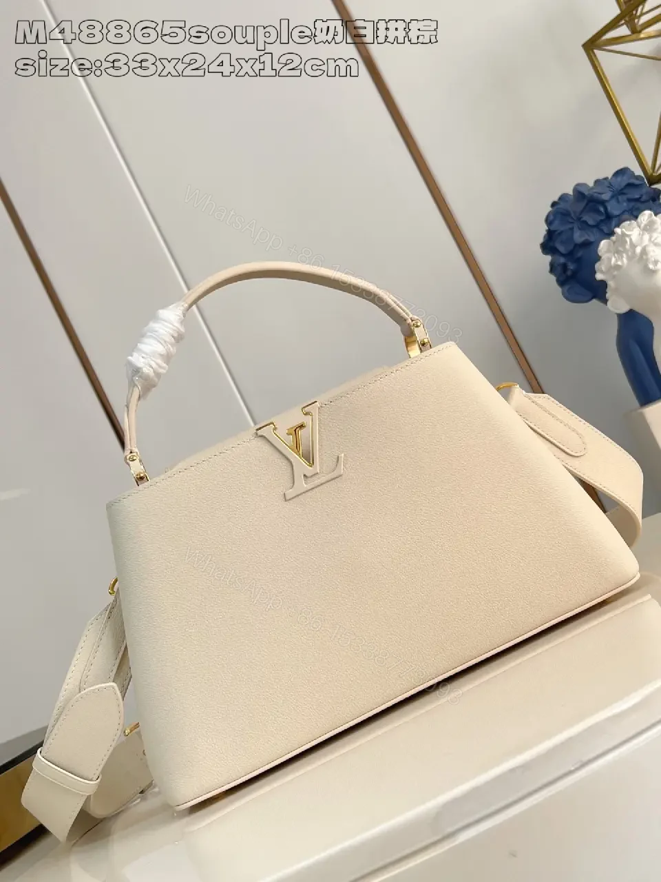 Cream Pebbled Leather Structured Handbag with Gold Hardware — view 1