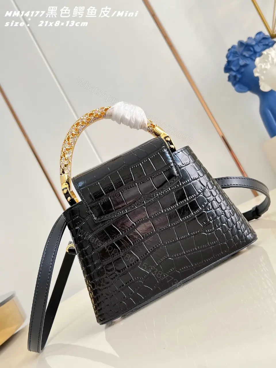View 3 of Crocodile-Texture Mini Bag with Gold Emblem – Luxe Everyday Glam