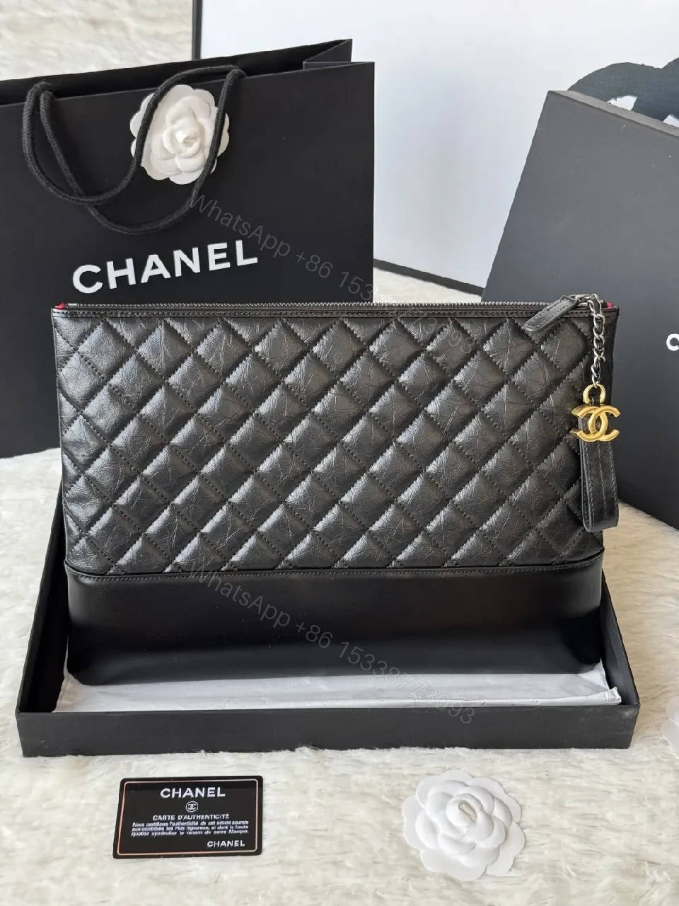 View 4 of Quilted Leather Wristlet: Modern Luxury, Compact Chic