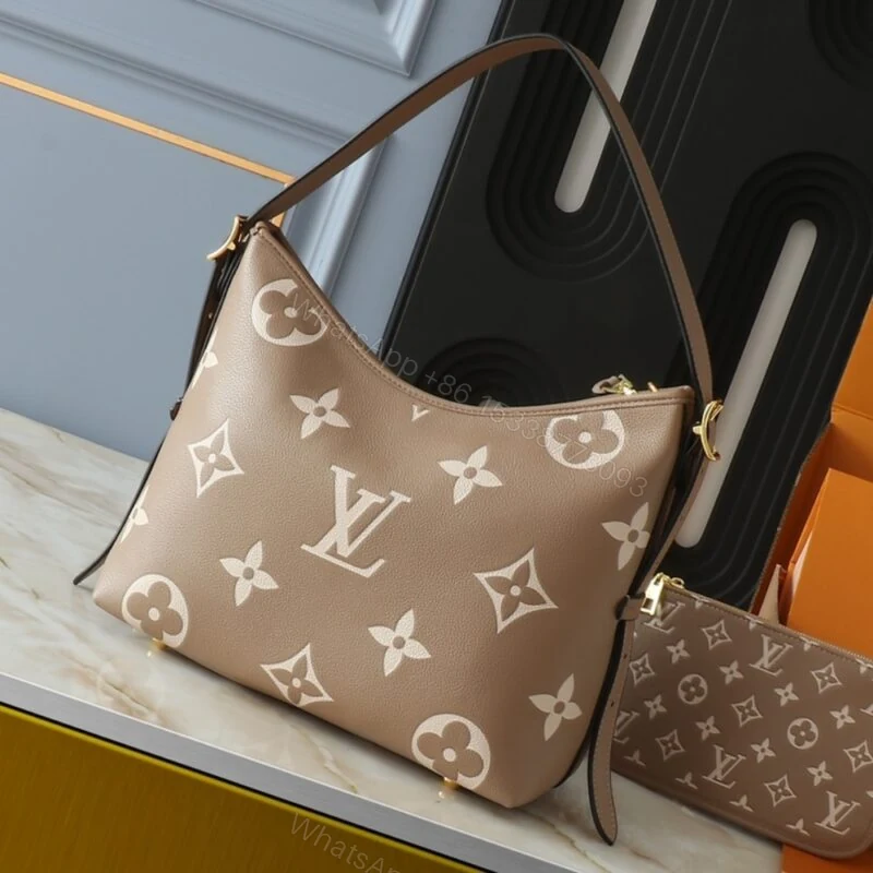 View 3 of Louis Vuitton Carryall PM Bicolor Monogram Empreinte Dove And Cream 29Cm M47180