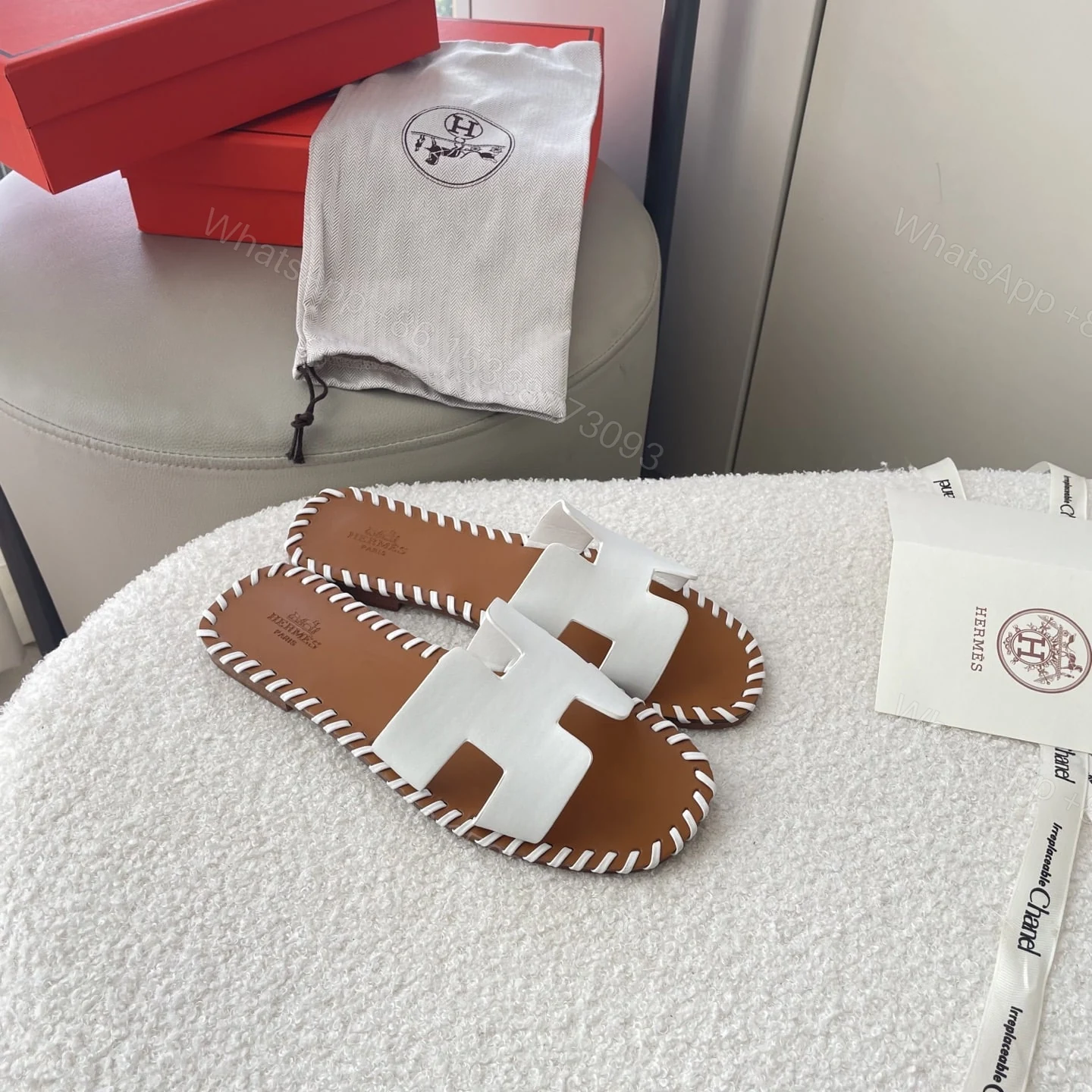 View 3 of HERMÈS ORAN SANDALS STITCHING IN BROWN AND WHITE