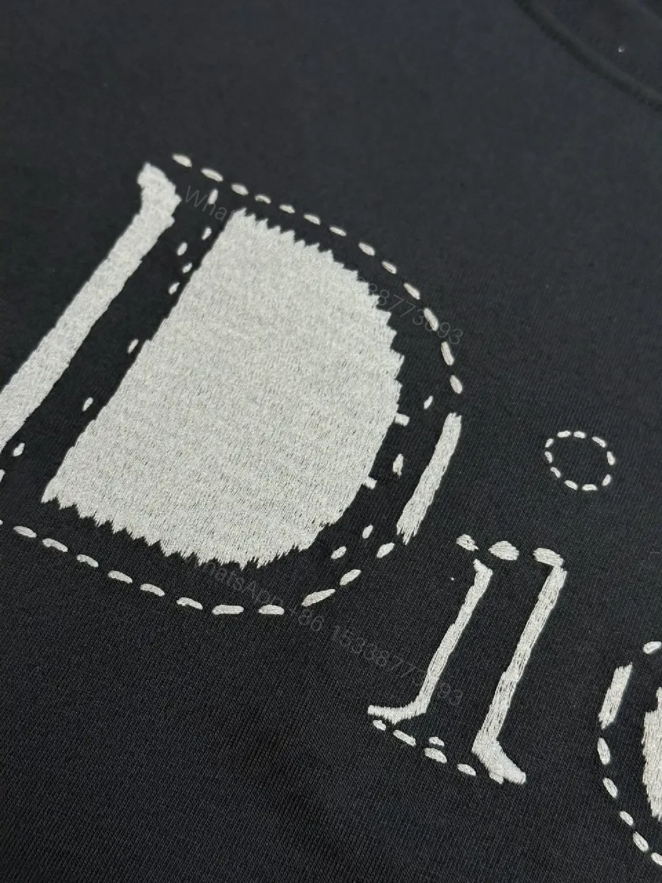 View 9 of Minimalist Black Cotton Tee: Subtle Dior-Inspired Luxury Knit