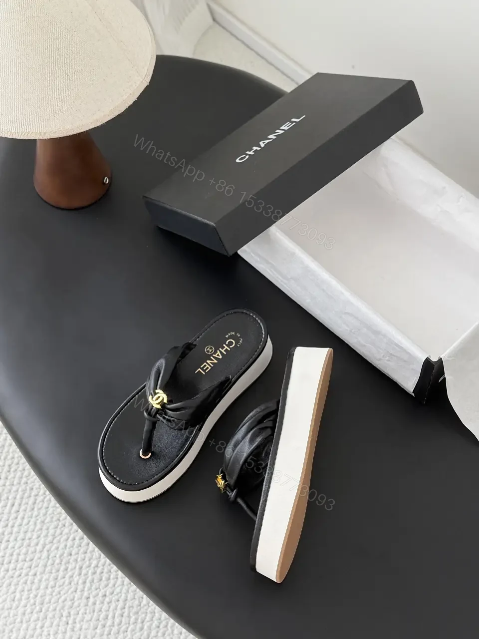 View 6 of Black Leather Slide Sandals with Gold Chanel Logo
