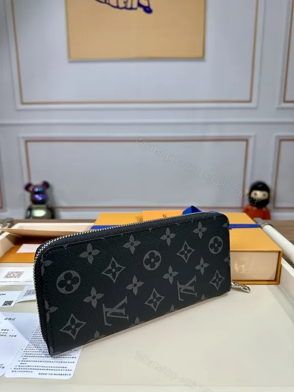 View 2 of Refined Monogram Zip Wallet: Luxury Texture, Everyday Versatility