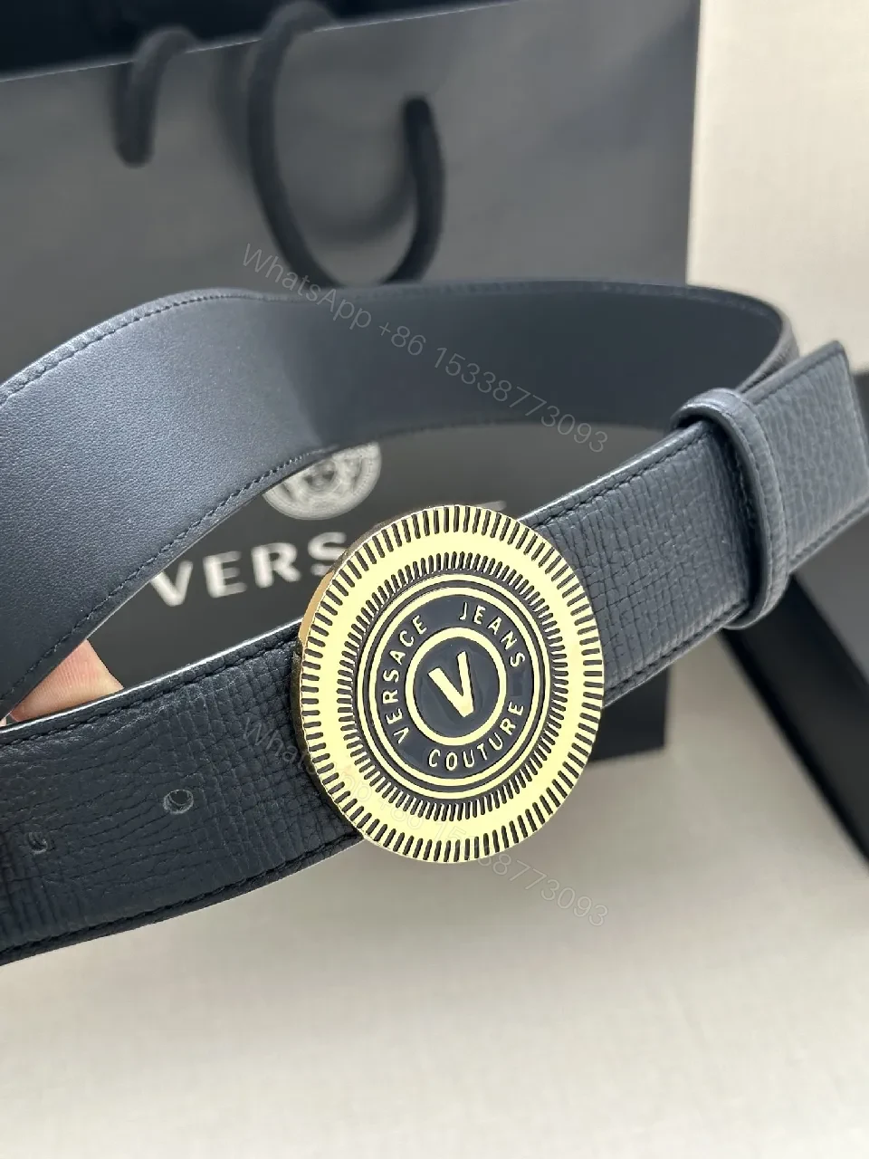 View 2 of Black Leather Belt with Gold Emblem - Premium, Textured Style