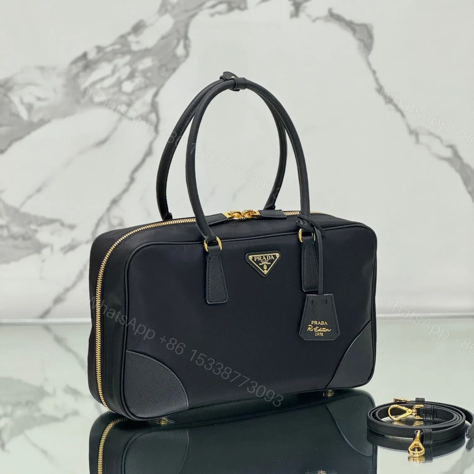 View 2 of LARGE TOP HANDLE BAG 35 IN BLACK NYLON AND CALFSKIN TRIM