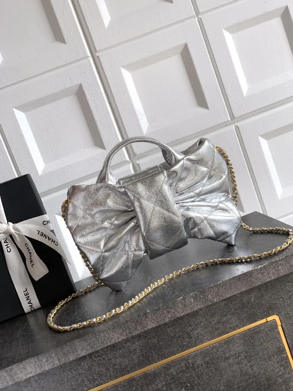 View 2 of Metallic Quilted Handbag with Gold Hardware Statement Bag