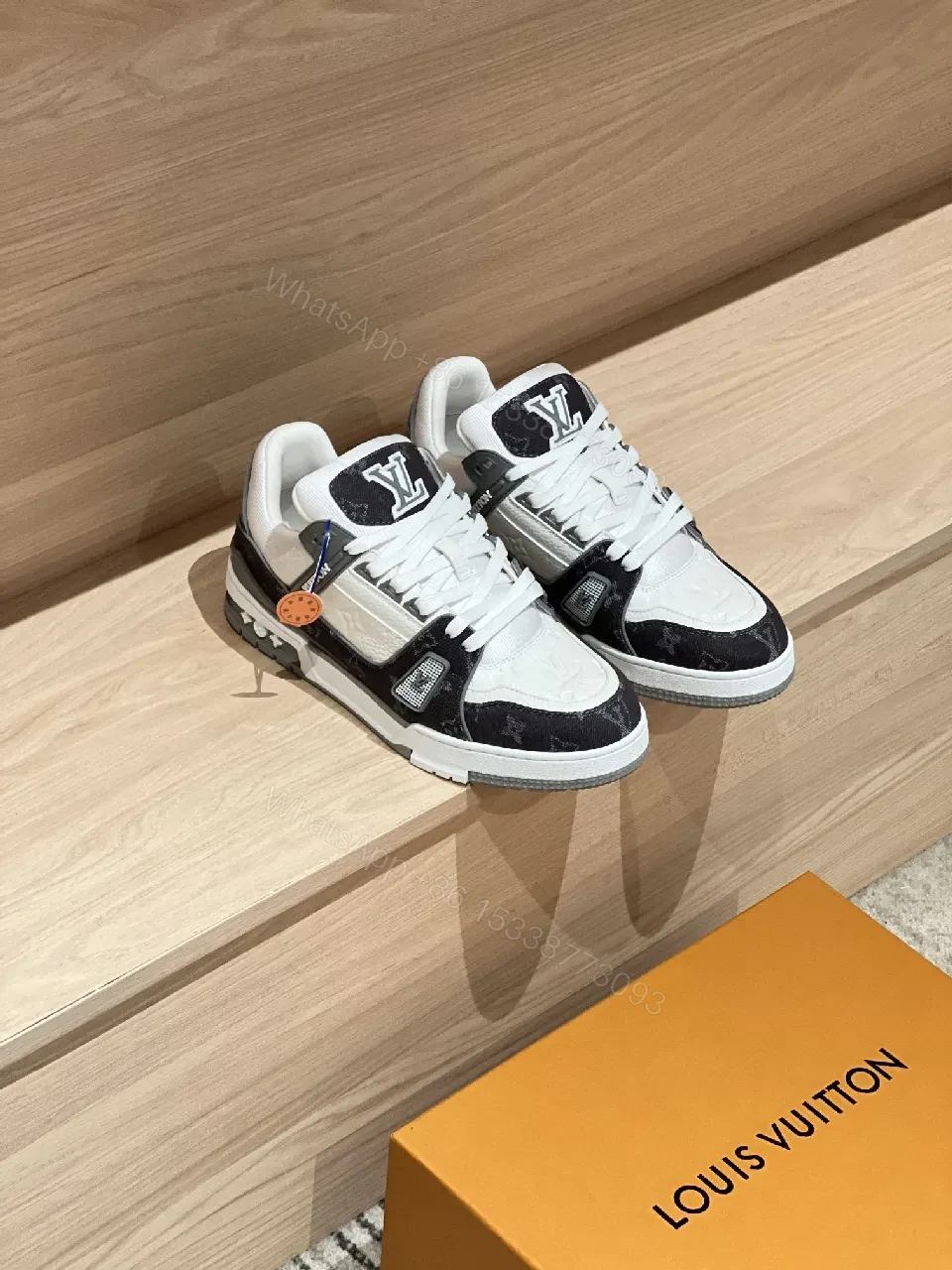 Two-Tone White & Black Leather Low-Top Sneaker with Luxury Details — view 1