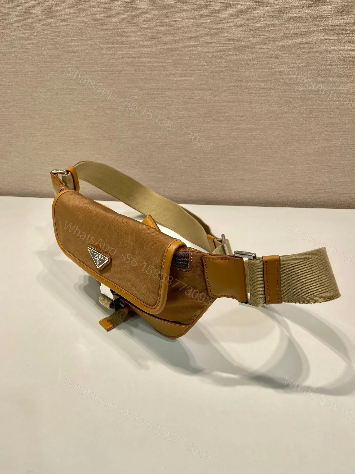 View 2 of BELT BAG 18 IN SEPIA BROWN RE-NYLON AND CALFSKIN TRIM