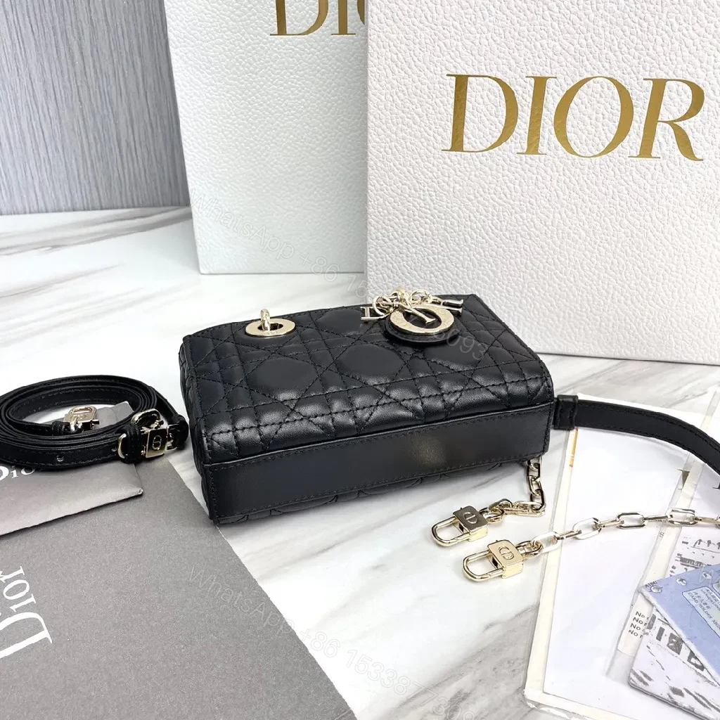 View 2 of Compact Faux-Leather Quilted Mini Bag with Gold Charms