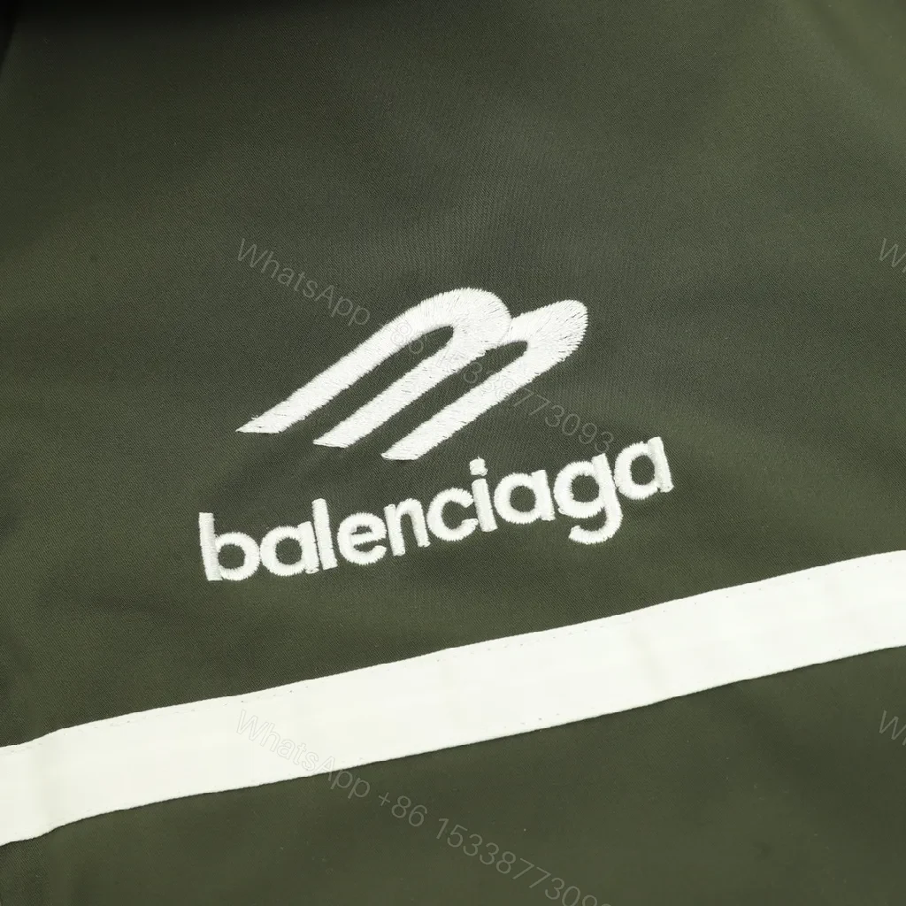 View 8 of Olive Pave Coach Jacket: Subtle Stride, Bold Presence
