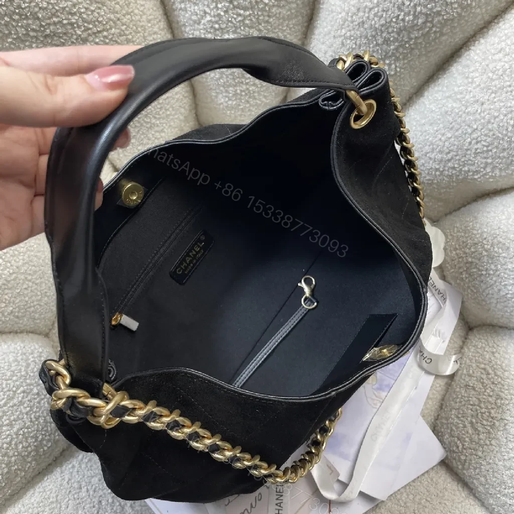 View 9 of Quilted Black Bag with Gold Chain, Top Handle, Compact
