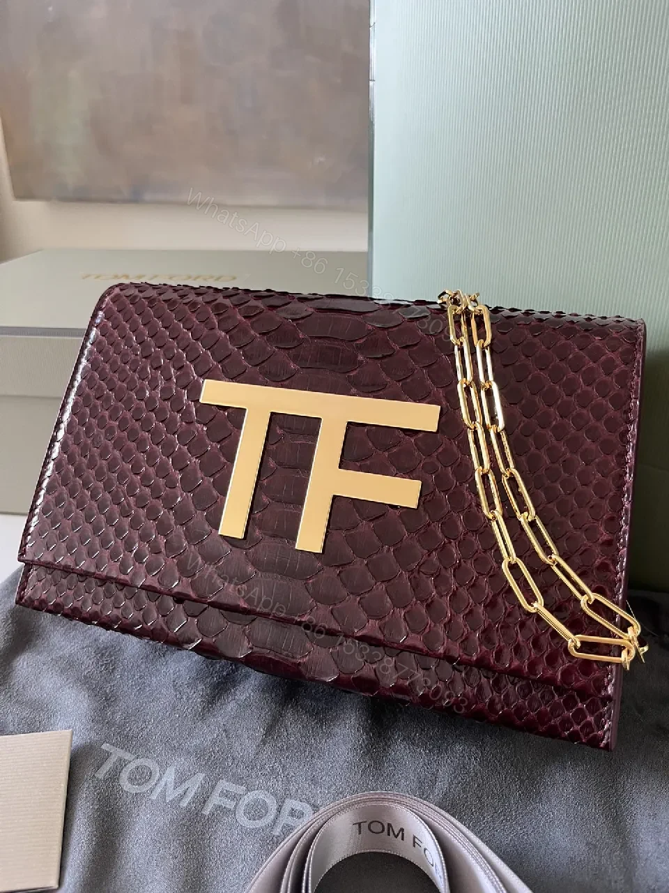 View 2 of Burgundy Python Textured Clutch with TF Gold Hardware
