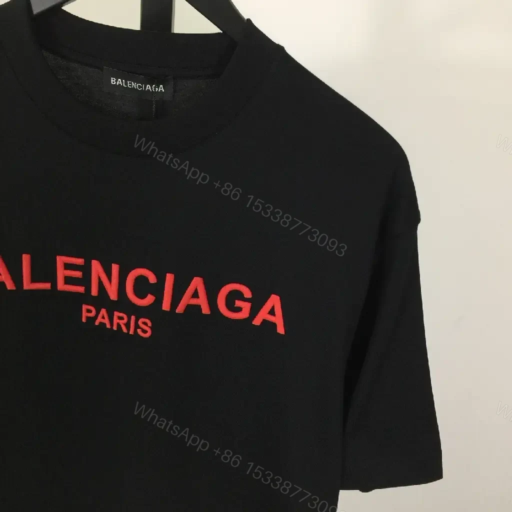 View 6 of Black Cotton Tee — Elevated Streetwear Logo Tee