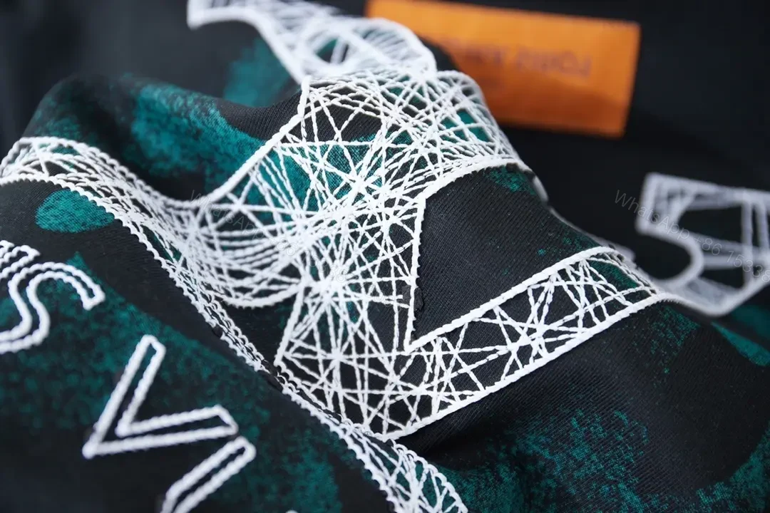 View 2 of Black Cotton Crew Tee with Subtle Crest Embroidery