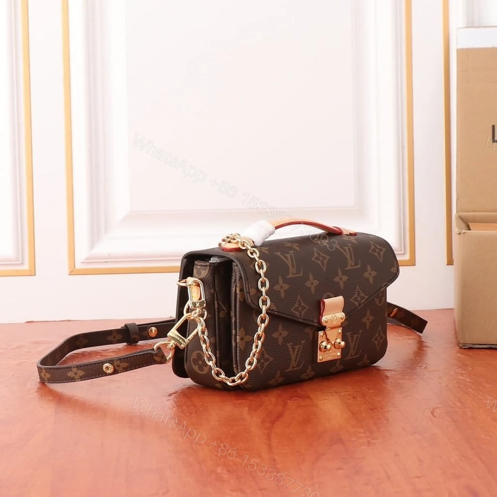 View 3 of Louis Vuitton Pochette Métis East West Bag Monogram Brown 22Cm M46279