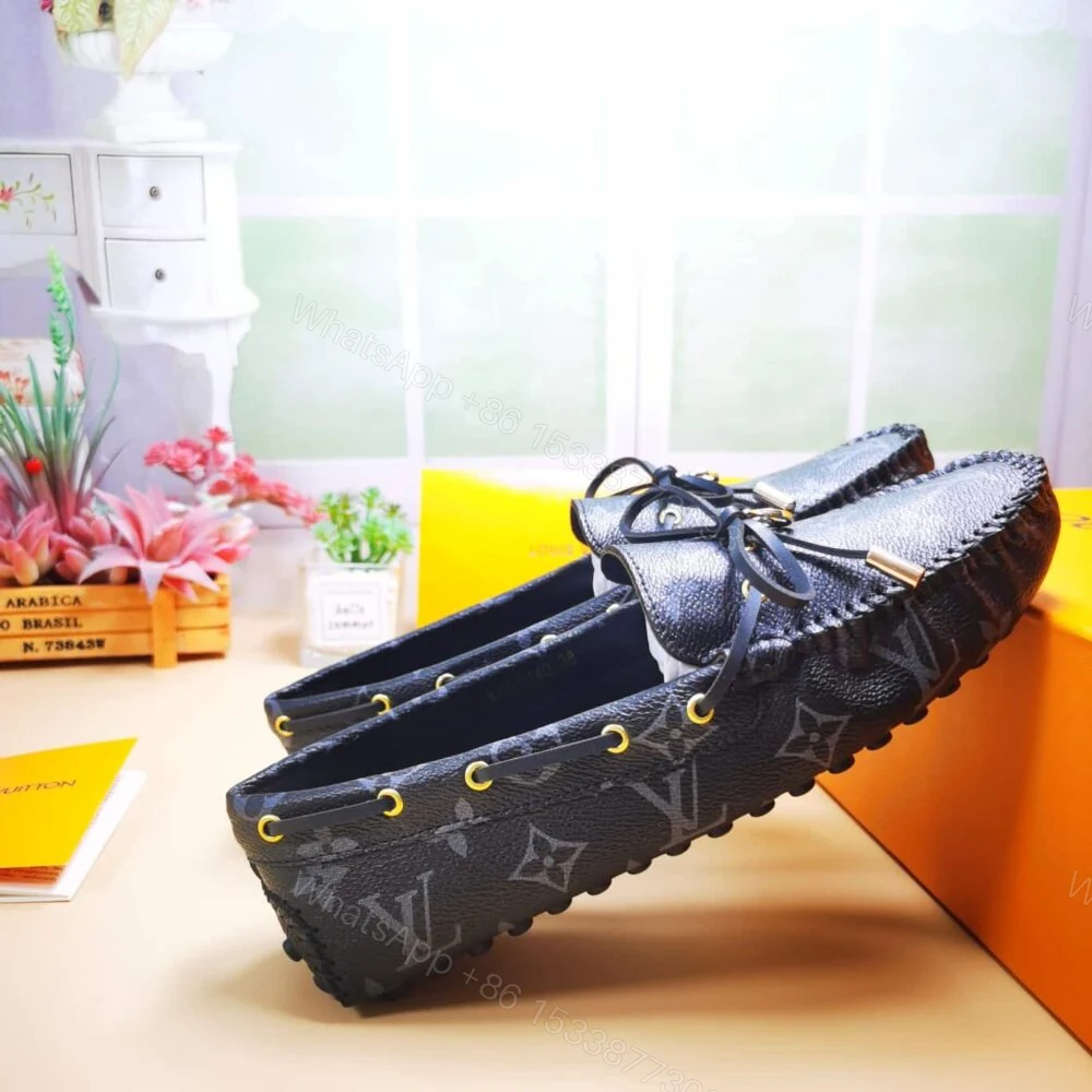 View 4 of Louis Vuitton Gloria Loafers Monogram Black