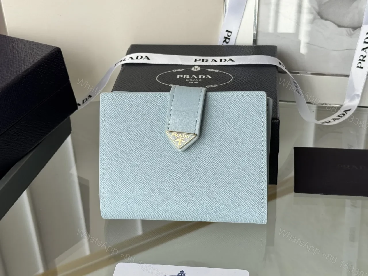 View 8 of Blue Saffiano-Like Bifold Wallet with Triangle Closure, Minimal Luxury