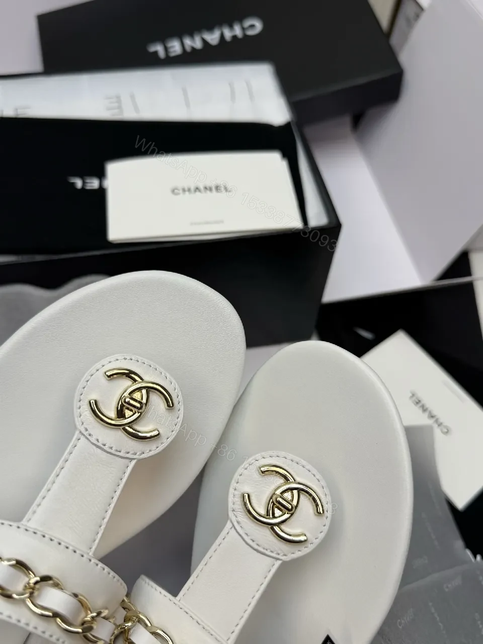 View 8 of Elegant White Leather Sandals with Gold Chain Accent