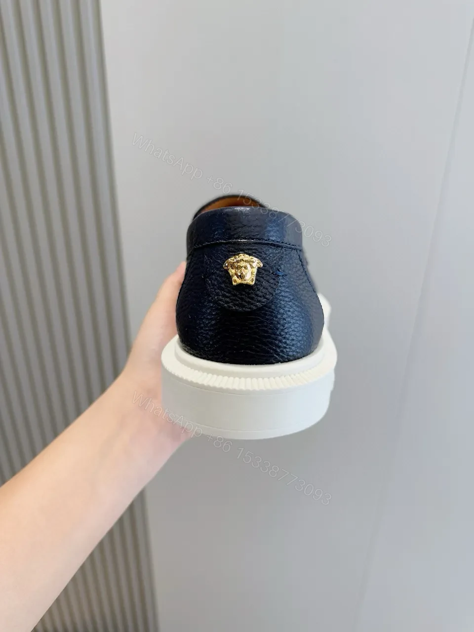 View 3 of Navy Leather Slip-On Loafers with Gold Branding