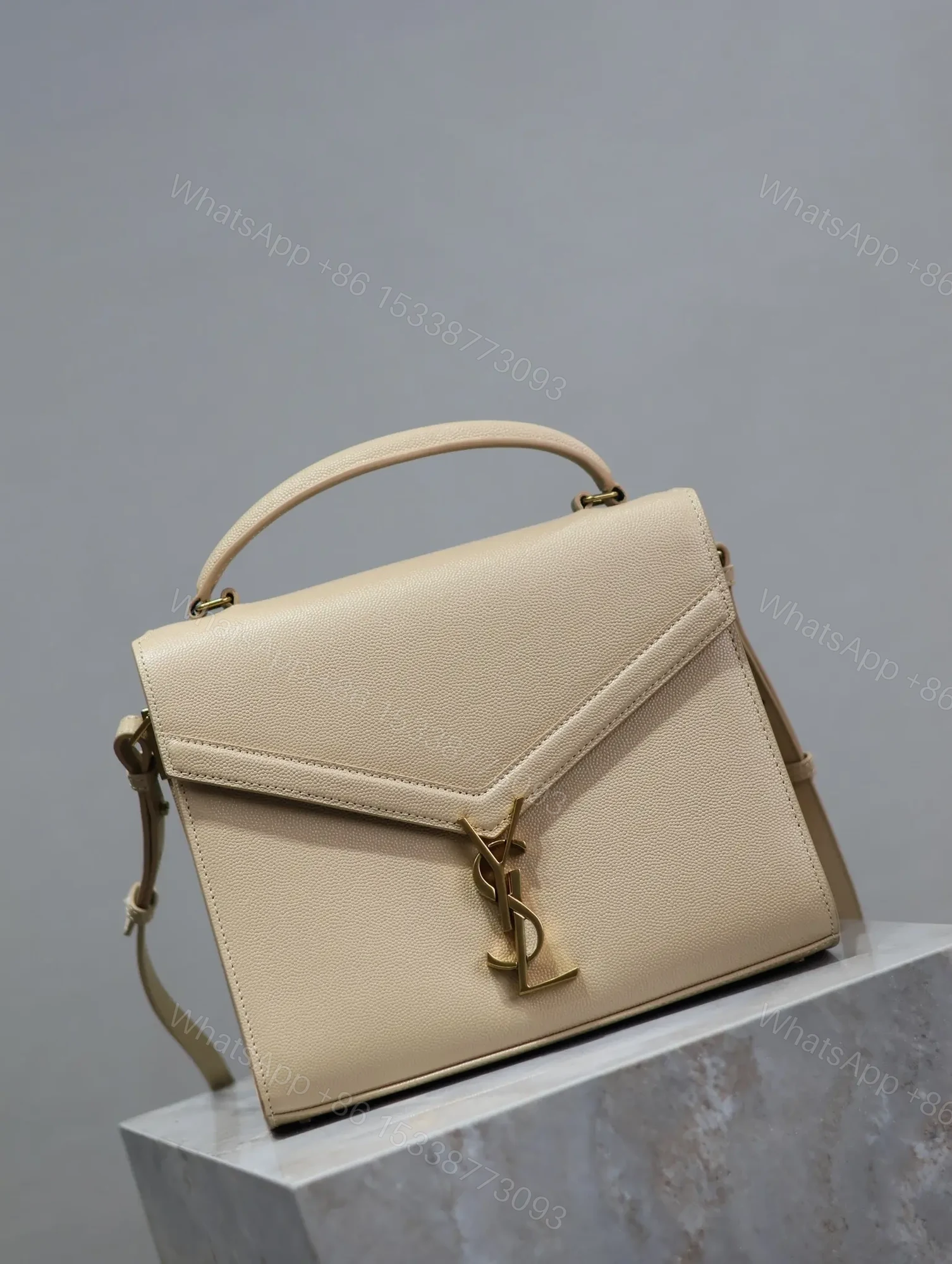 View 9 of YSL CASSANDRA TOP HANDLE BAG MEDIUM IN BEIGE CALFSKIN GOLD HARDWARE