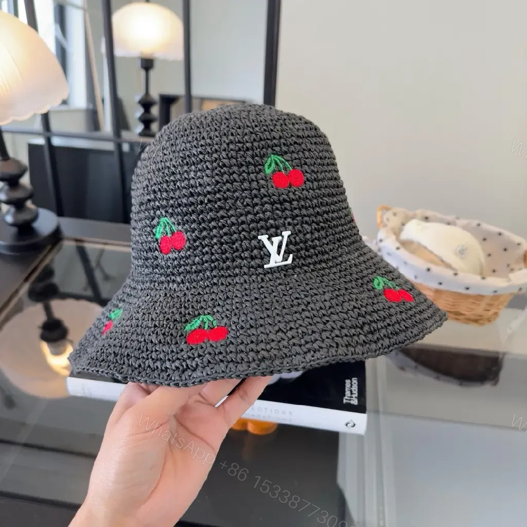 View 8 of Charcoal Crochet Bucket Hat with Cherry & LV Accent