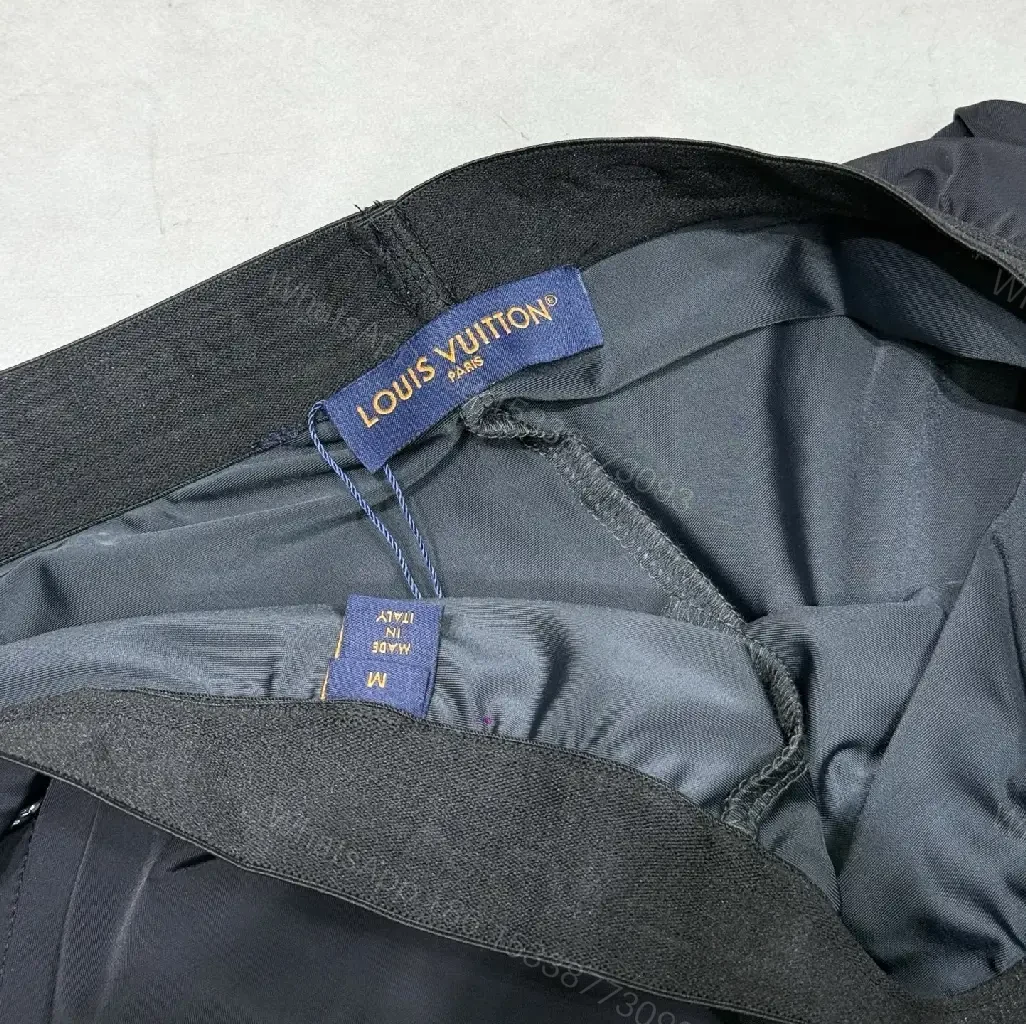 View 10 of Matte Black Quick-Dry Shorts with Subtle LV Detailing