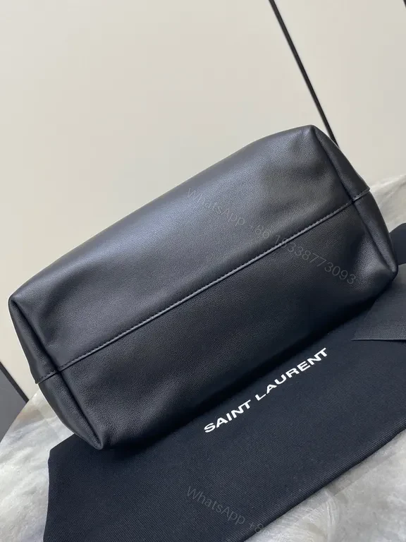 View 9 of Minimalist Black Leather Drawstring Bucket Bag with Gold Hardware