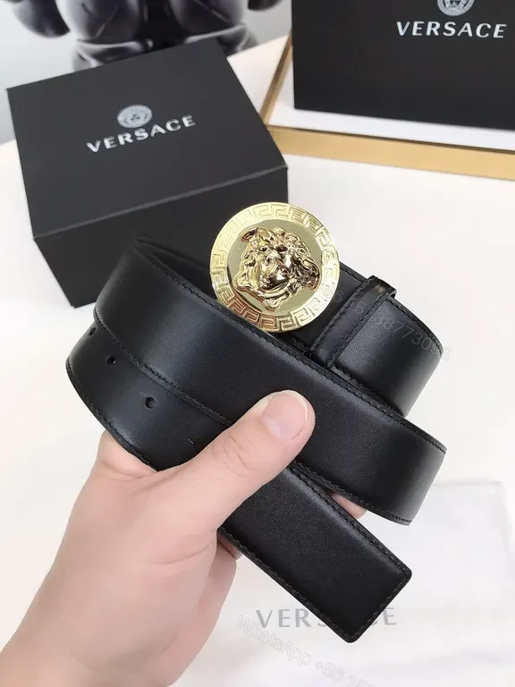 View 4 of Bold Medusa Buckle Belt: Luxury Black Leather Accessory
