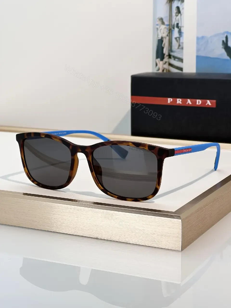 View 7 of Brown Tortoiseshell Sunglasses, Wayfarer-Inspired, Full-Frame, Mottled Pattern, Prada Logo Front