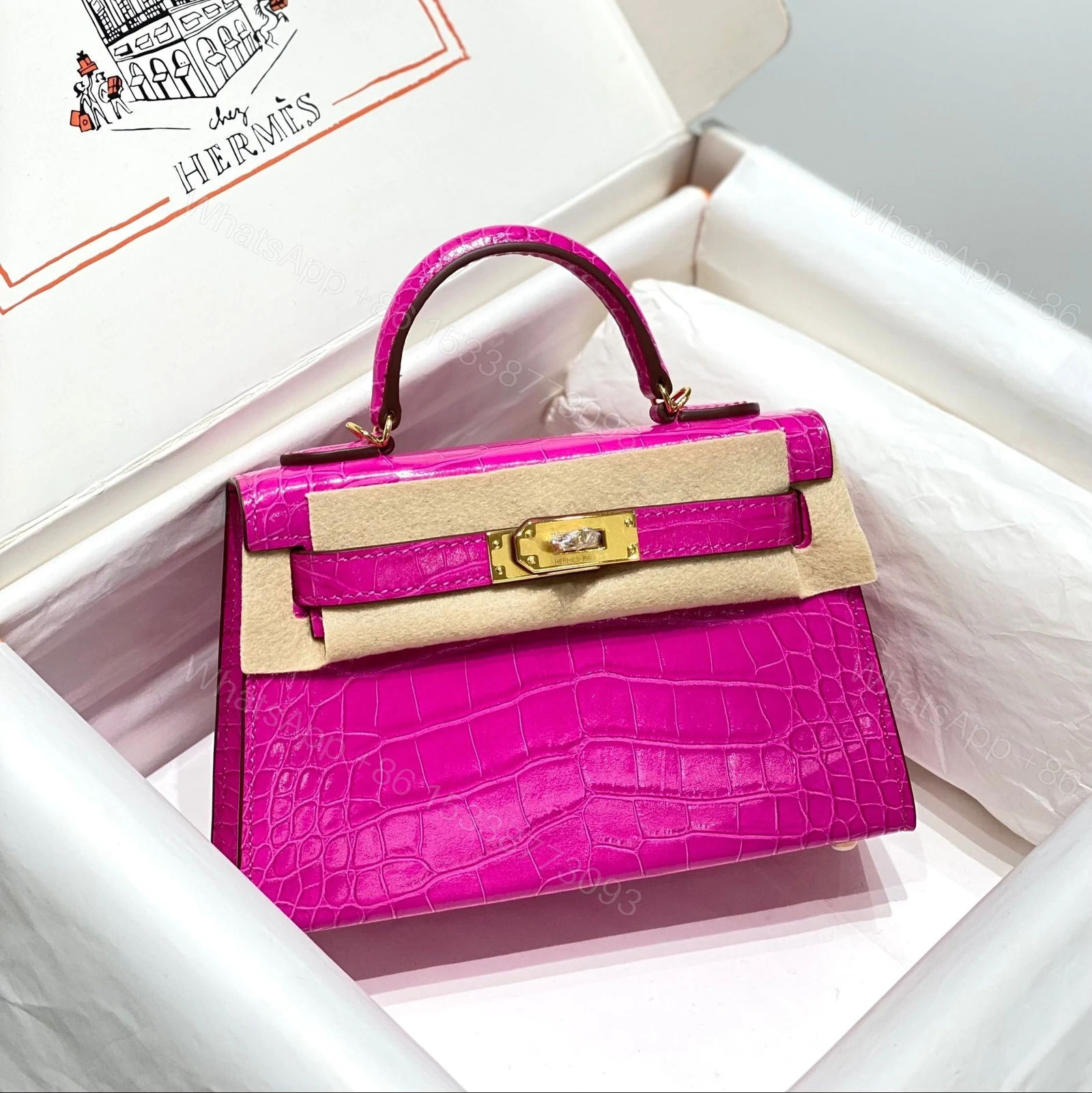 HERMES MINI KELLY IN DEEP MAGENTA CROCODILE SKIN GOLD HARDWARE — view 1