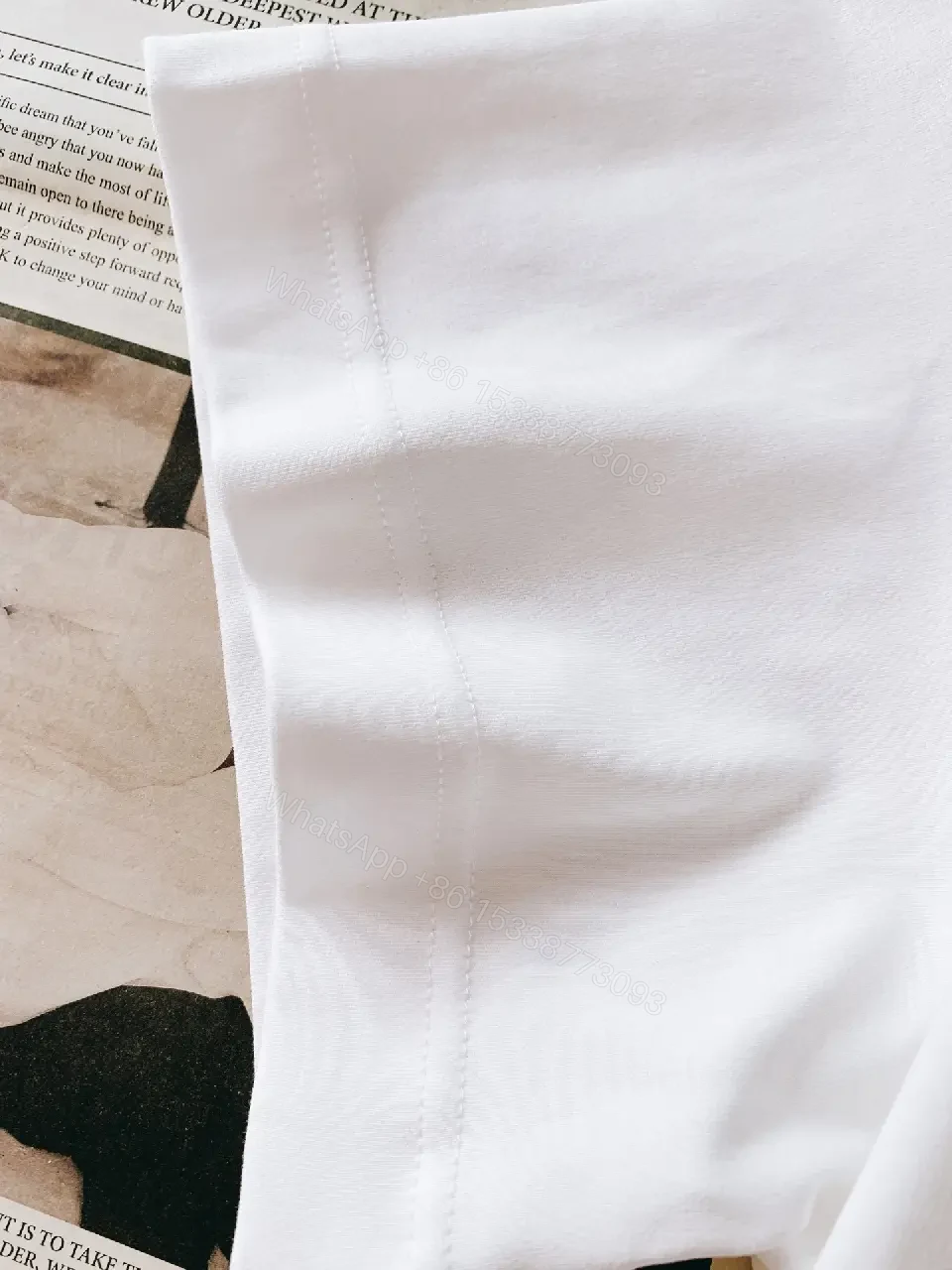 View 7 of Minimalist White Cotton Tee with Subtle Luxury Detail