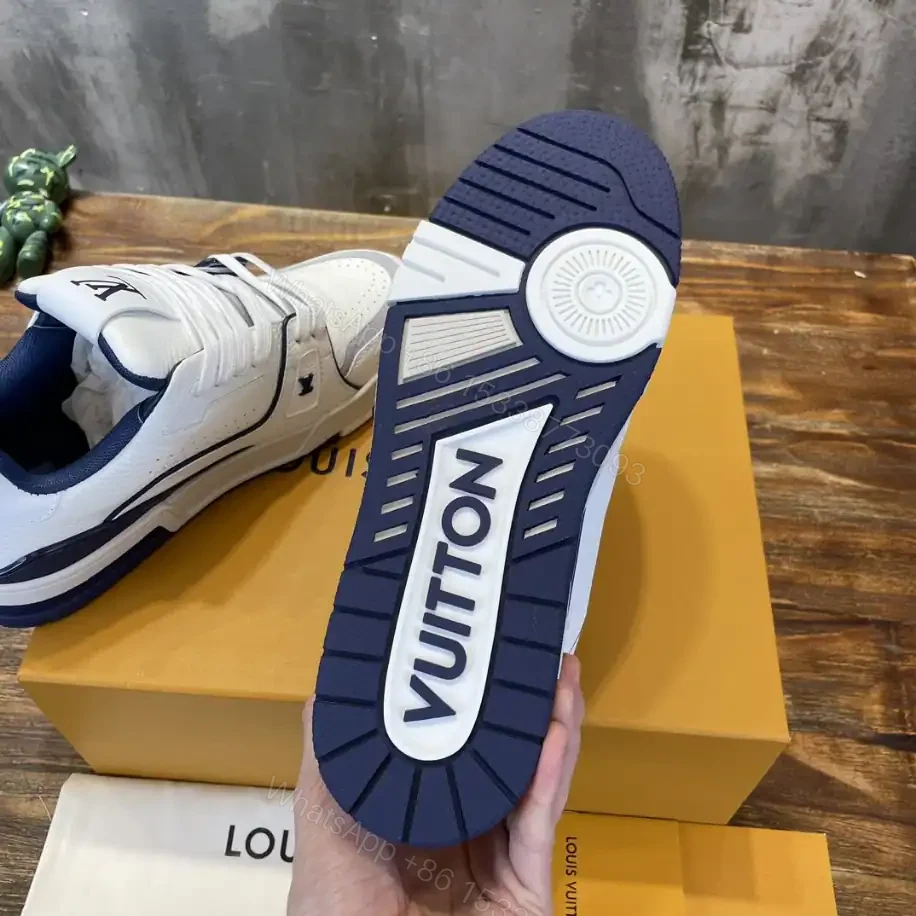 View 4 of LOUIS VUITTON LV TRAINER SNEAKERS IN WHITE AND NAVY BLUE – LSVT353