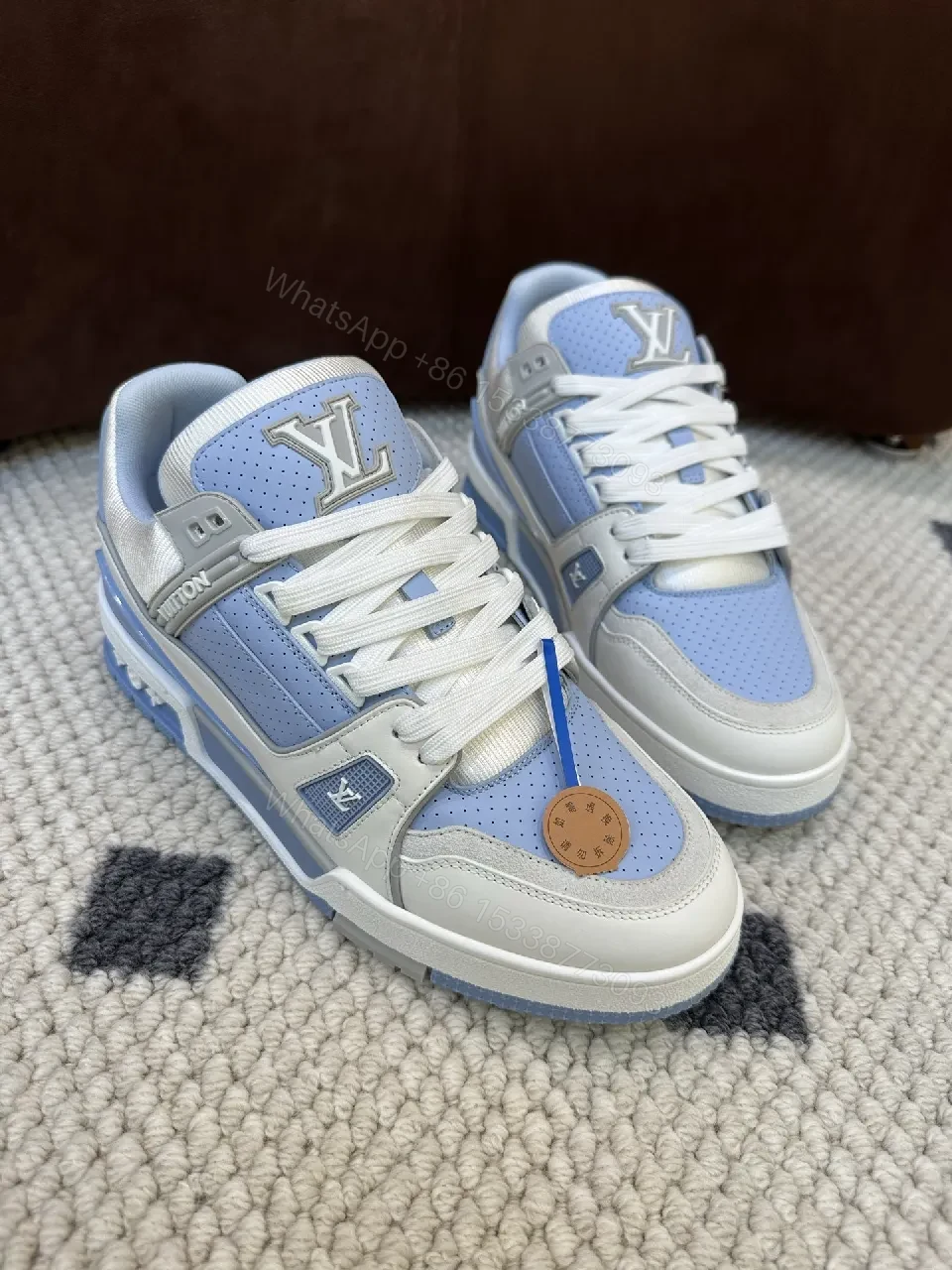 View 5 of Light-Blue Perforated Panels Modern Low-Top Sneakers with LV-Inspired Accents