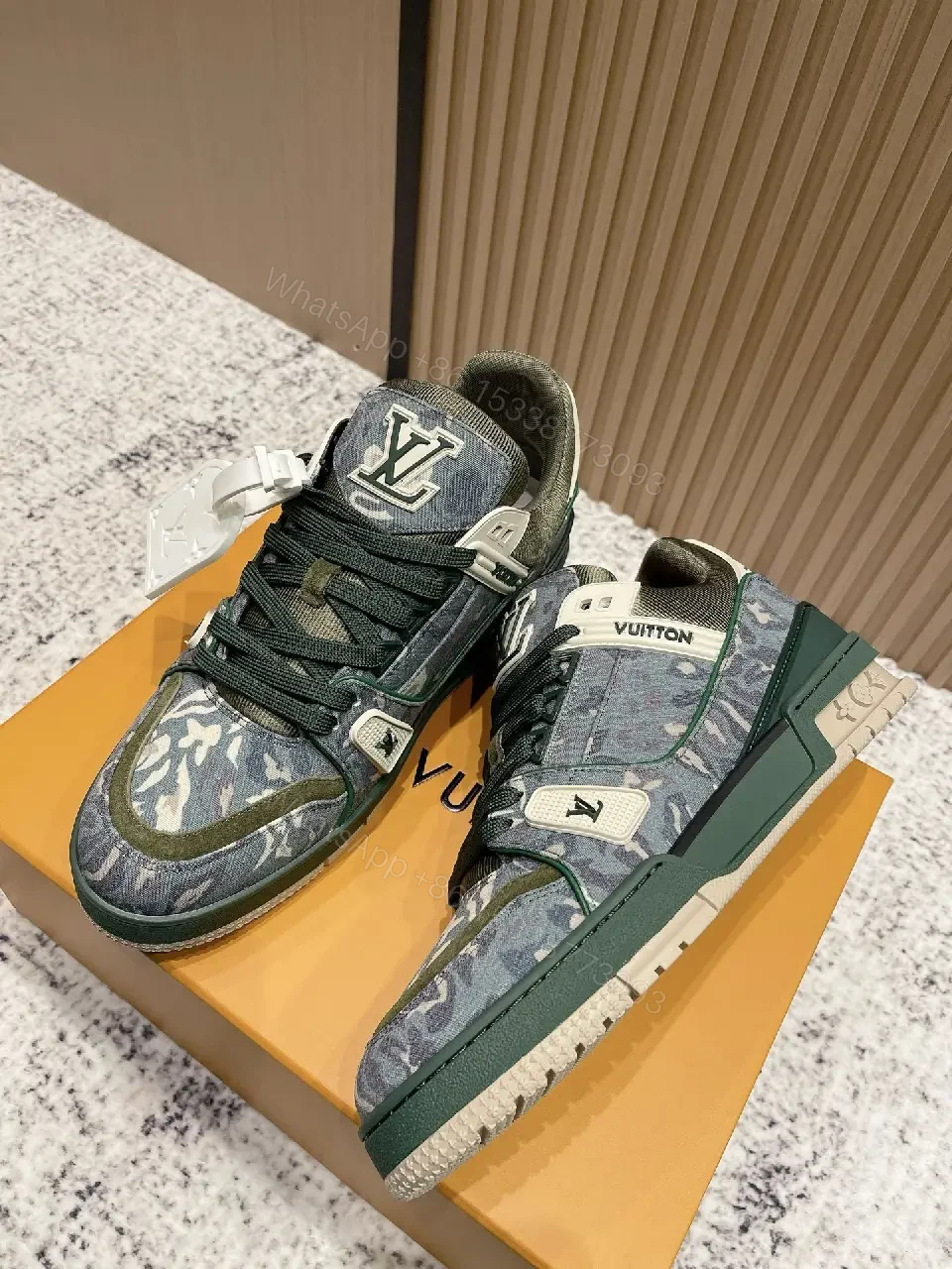 View 2 of Denim Textured Sneaker with LV Detailing, Modern Couture Outdoors
