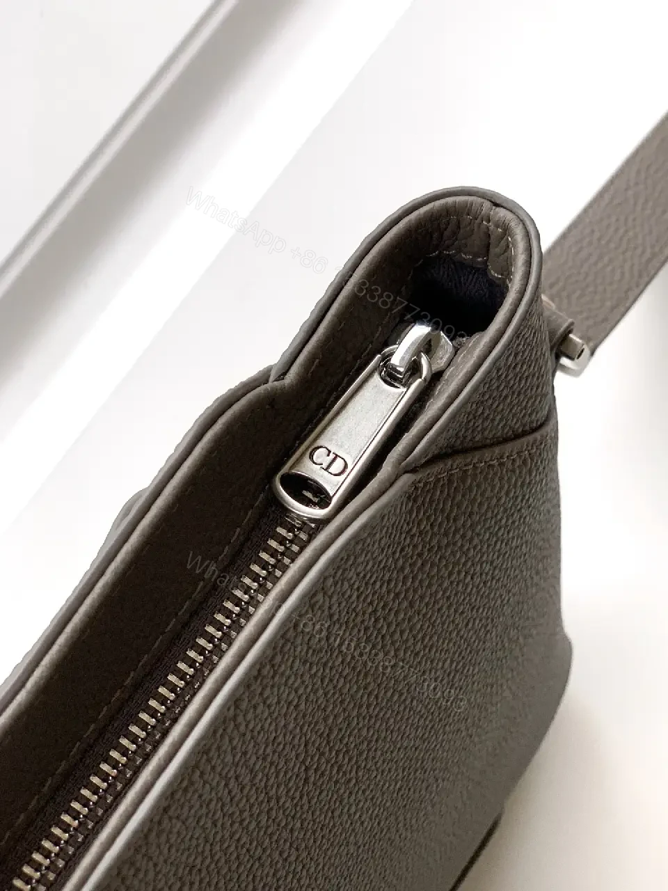 View 4 of Grey Leather Matte Dior Clutch with Top Handle and Wrist Strap