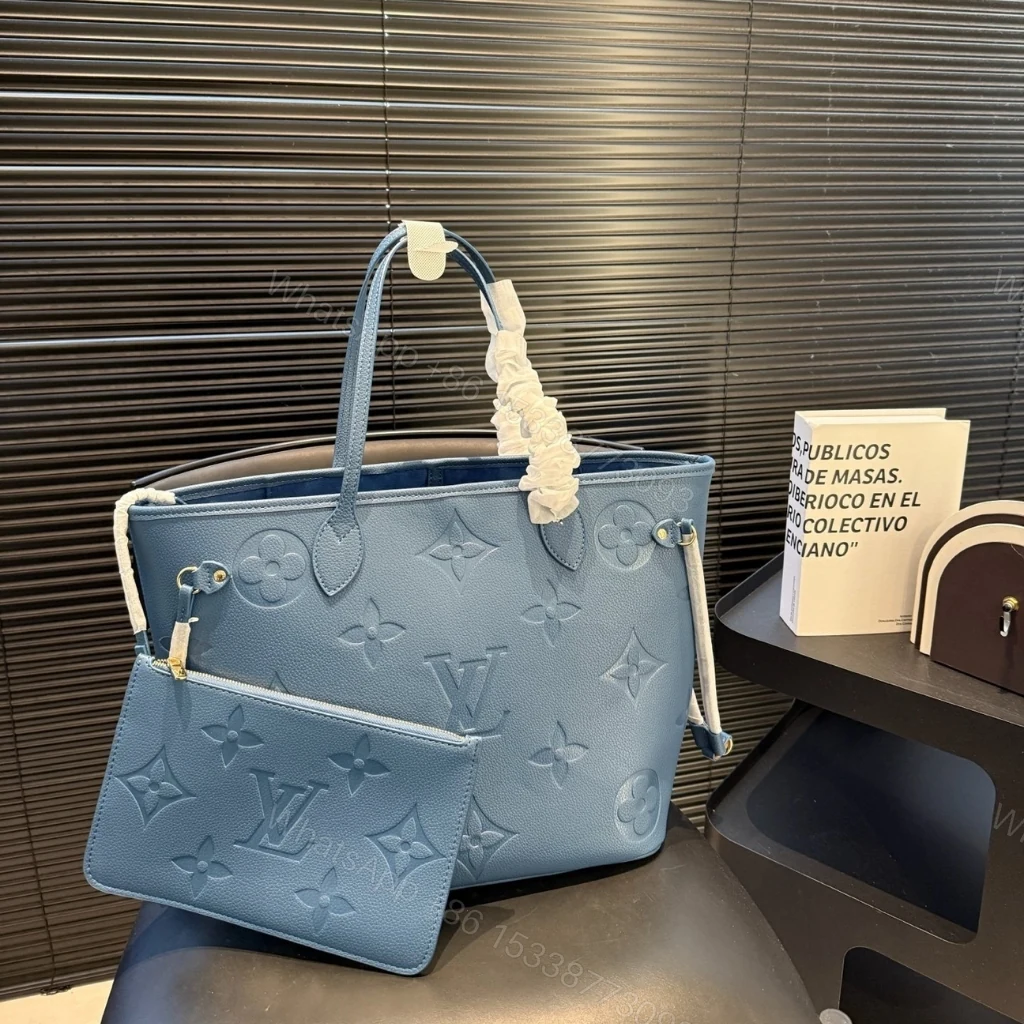 View 2 of Louis Vuitton Neverfull MM Tote Bag Monogram Empreinte Bleu Jean 31cm M27358