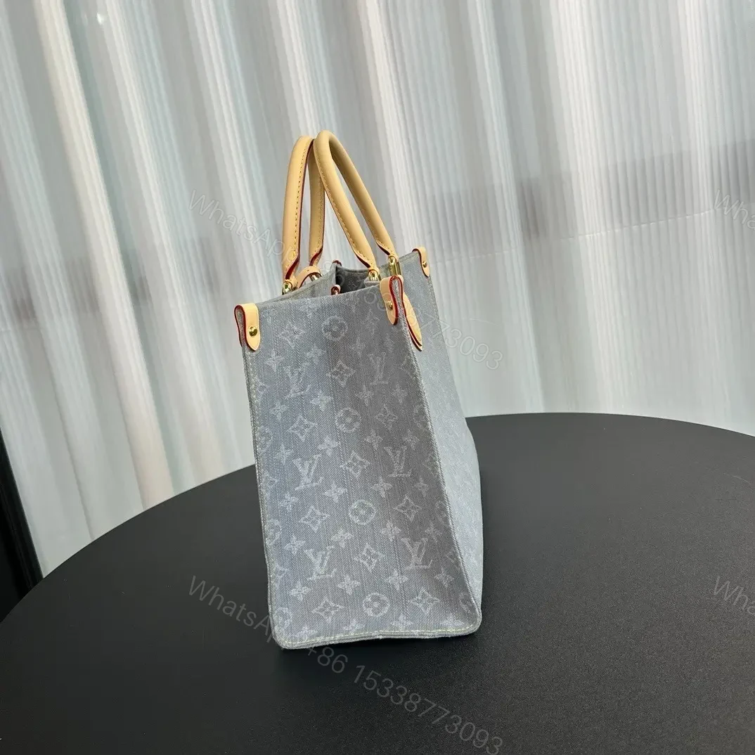 View 4 of Louis Vuitton OnTheGo MM Monogram Denim canvas