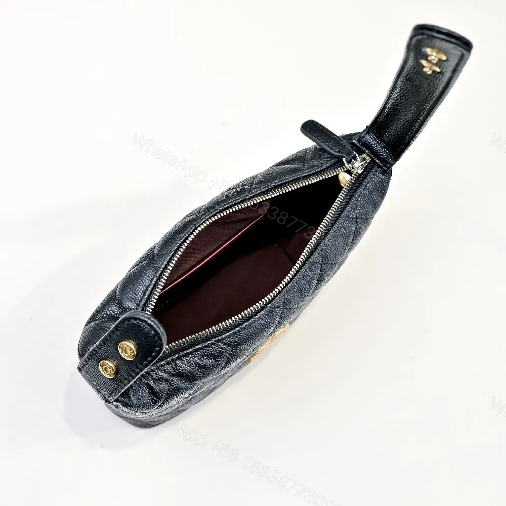 View 4 of Compact Black Quilted Mini Bag with Gold Hardware, Crossbody Style