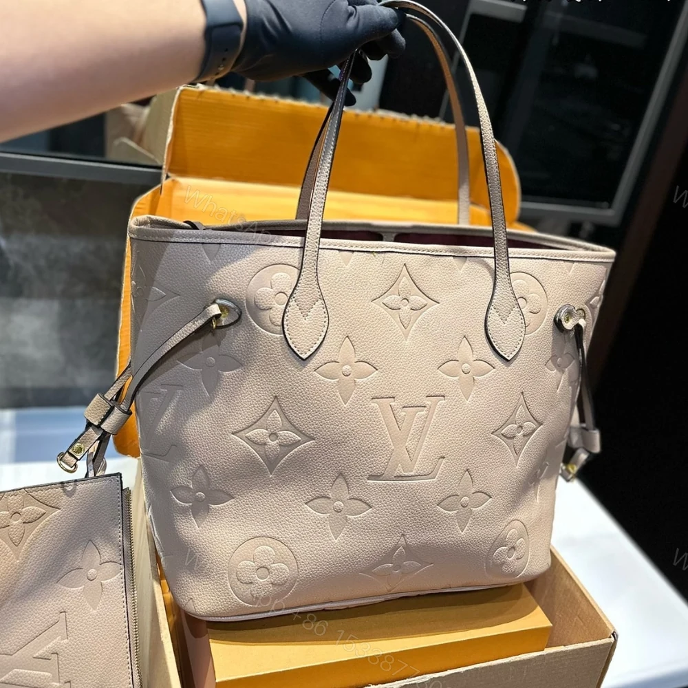View 2 of Louis Vuitton Neverfull MM Monogram Empreinte Bag Beige 32Cm